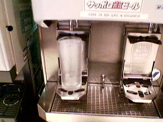 A glass placed in the beer machine